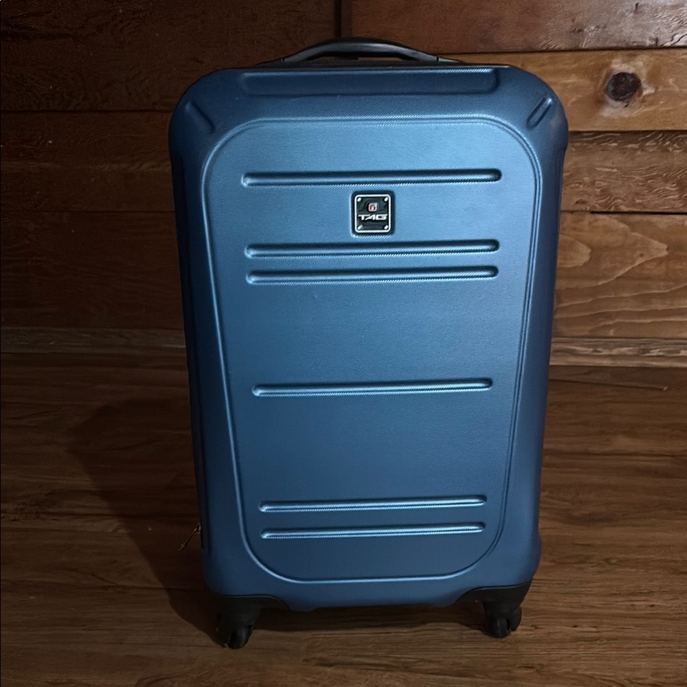 Blue Tag Shell Suitcase With Wheels - image 1